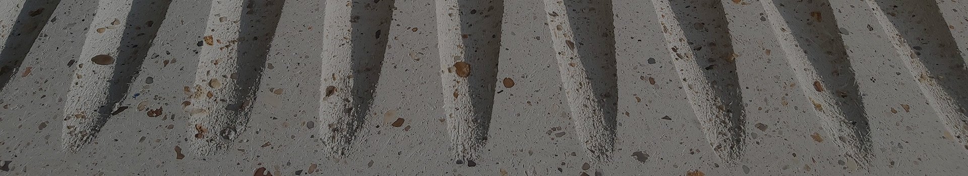 Grey Concrete with multi-coloured aggregate